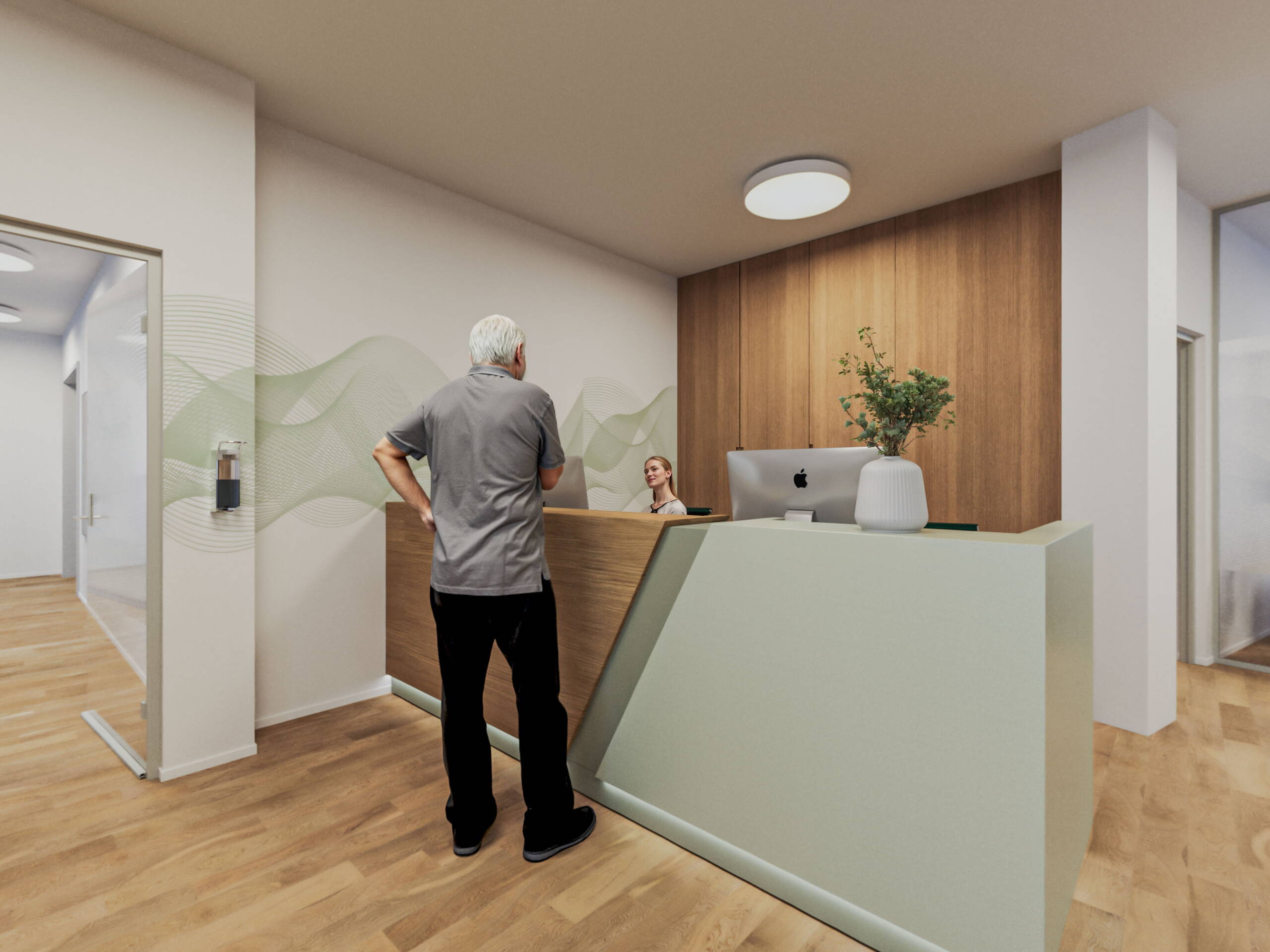 vitaone Empfang Klinik vitaone Empfang Klinik, Mann steht am Empfang